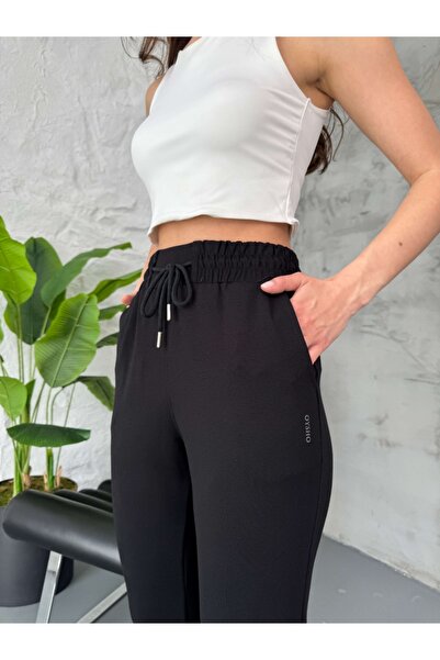 Elif Özbey Butik Μαύρη φόρμα με σχισμή Modal