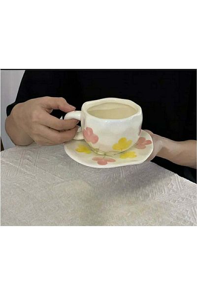 Generic White ceramic coffee mug decorated with pink and yellow flowers - a touch of natural elegance