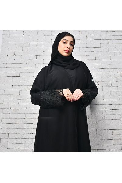 LAMHA Elegant black wrap abaya with a prominent orchid design on the sleeves