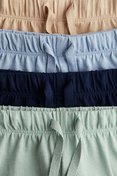 H&M مجموعة من 4 شورتات جيرسي