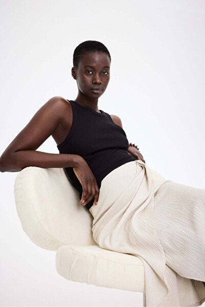 H&M تنورة ملفوفة من قماش الجيرسي المزخرف من ماما