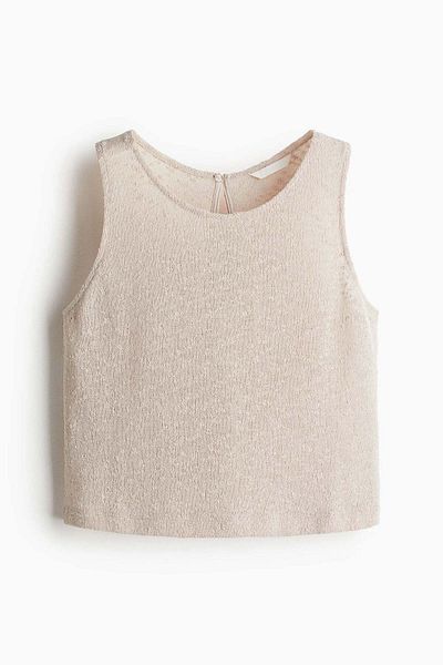 H&M بلوزة محبوكة بنسيج