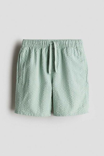 H&M شورت قطني من قماش السيرساكر