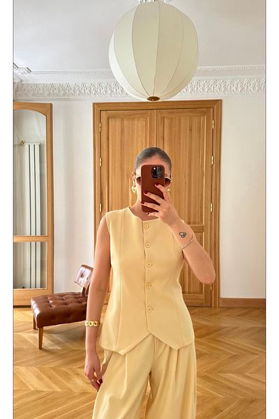 Zey Studio Women's Yellow Crew Neck Asymmetrical Cut Premium Vest