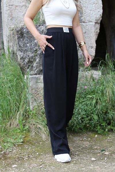 bytugcekaya Black back pocket detail elastic waist lettered pants
