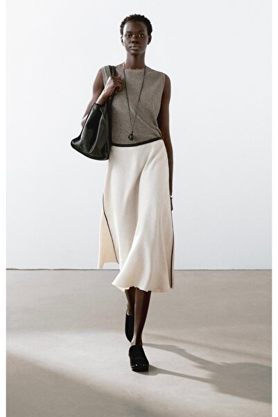 Çnru ÜNLÜ MARKANIN MUADİLİ, VOLANLI, YANDAN FERMUARLI MİDİ BOY KETEN ETEK