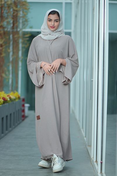 abayahasnaa Cloche abaya with lace inserts on the sleeves