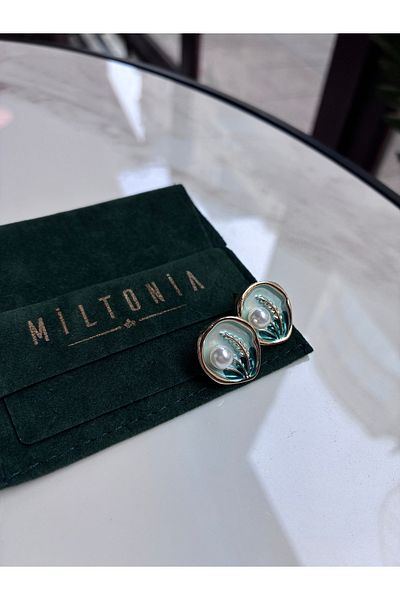 Miltonia Flower motif pearl steel earrings
