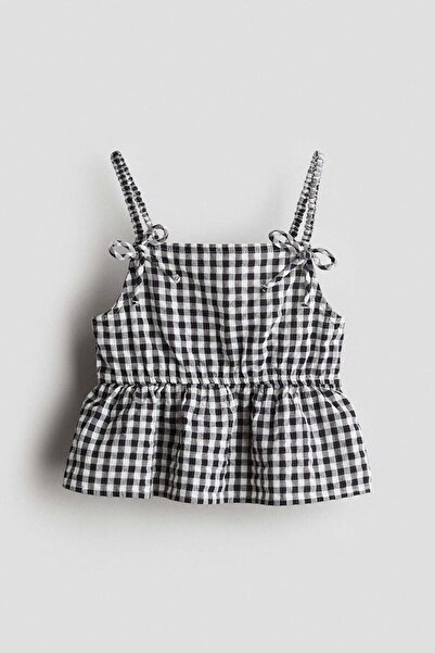 H&M بلوزة ببلوم بتفاصيل فيونكة