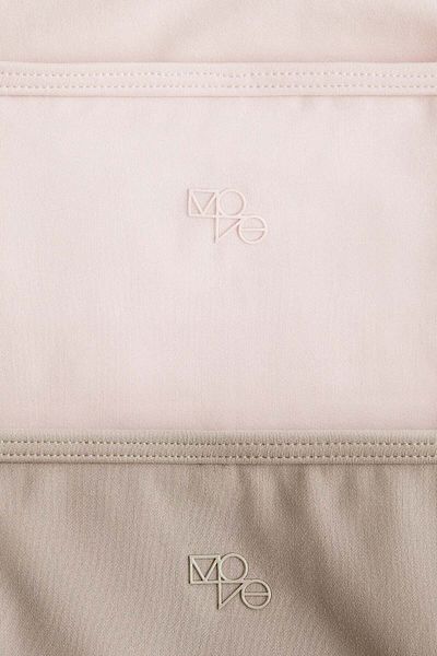H&M قطعتان من القمصان الرياضية ذات الأشرطة من DryMove™