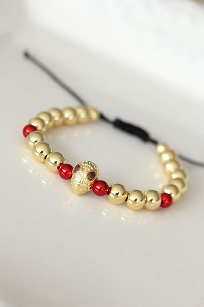 Clariss Gold Color Steel Bracelet with Red Eyed Mask Figure