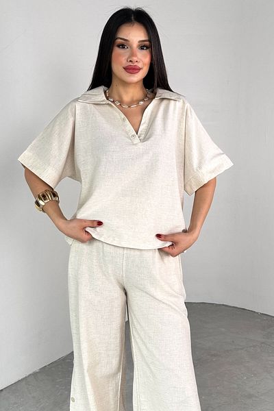 Cappmoda TKM-25110 krémszínű pólógallér rövid ujjú blúz gomb részletes széles szárú nadrág nyári kétrészes szett