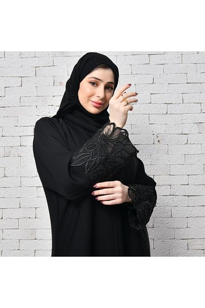 LAMHA Elegant black wrap abaya with a prominent orchid design on the sleeves