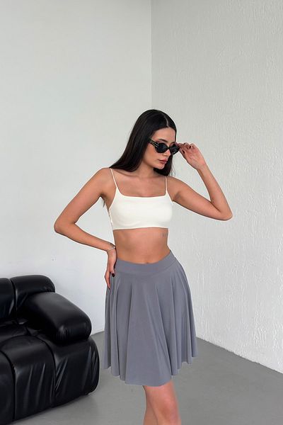 XORVİO Model evazat de culoare gri pentru femei, cu volan, textura moale, elastic, talie elastică, fustă cu pantaloni scurți din țesătură Sandy în interior