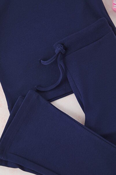 TRENDYOLKIDS Sötétkék pamut sima, rugalmas póló és kötött alsó felső szett flare/spanyol szárú leggingsgel TKDSS25AU00136