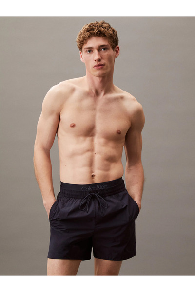 Calvin Klein Erkek Beli Lastikli Ve İp Bağlamalı Çabuk Kuruyan İnce Kumaşlı Lacivert Şort Km0km01104-cef