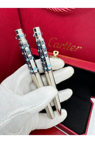 Cartier Two luxuriously designed Cater pens with accessories