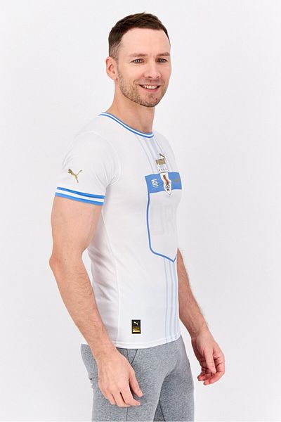 Puma قميص رياضي رجالي بأكمام قصيرة من اتحاد كرة القدم الأوروغواياني، أبيض