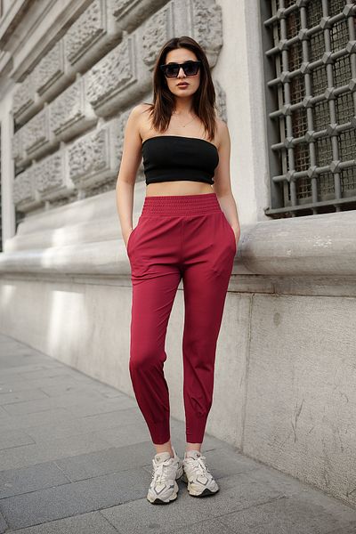 DeChival Women's Diver Fabric Double Pocket Waist Corset Detail Leg Pleated Full Flexible Track Pants