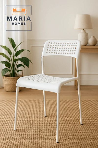 MARIA HOMES White Perforated Plastic Chair – Lightweight, Stackable & Ventilated Seating Solution