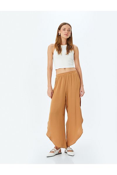 Koton Comfortable Fit Asymmetrical Aerobin Satin Trousers with Slits on the Sides