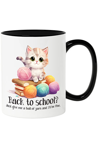 StoryGift Romania Cana cu o pisicuta care sta pe un teanc cu carti | gheme de...