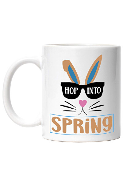 StoryGift Romania Cana cu un iepuras cu ochelari si mesajul "Hop into spring"...