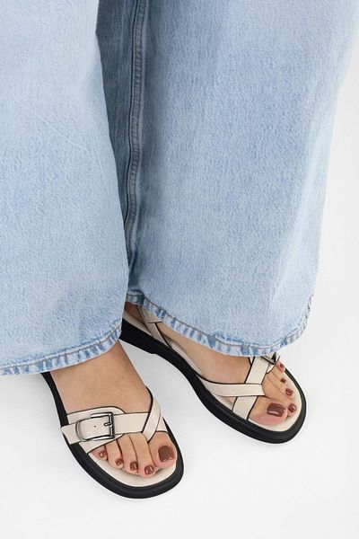 Shoeberry Women's Elina Beige Skin Belted Flip Flops Sandals