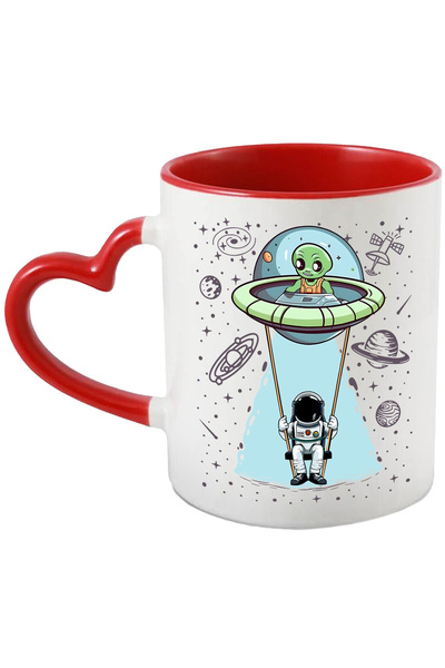 StoryGift Romania Cana cu un astronaut care se da intr-un leagan atasat de o farfurie zburatoare |, Cu Maner Inim