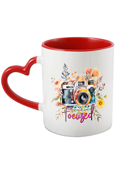 StoryGift Romania Cana cu un aparat de fotografiat cu mesajul "Stay focused",...