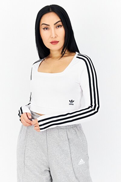 adidas بلوزة رياضية نسائية بأكمام طويلة وشعار العلامة التجارية، باللون الأبيض