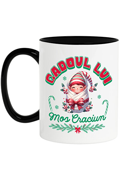 StoryGift Romania Cana cu Bebe in Paturica Cu Funda Rosie si Palarie Text Cadoul De Mos Craciun, C, Cu Maner Negru