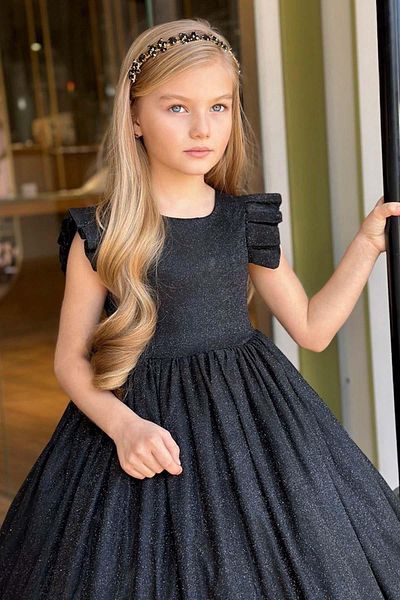 Riccotarz Girl's Sparkling Black Evening Dress with Ruffle Shoulders and Glitter
