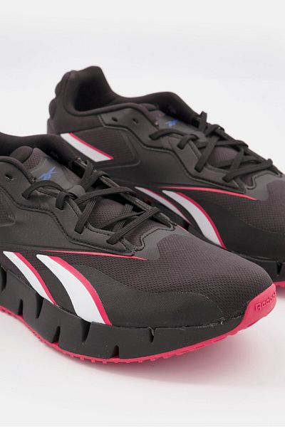 Reebok حذاء رياضي رجالي Zig Dynamica 4 برباط، لون أسود/أحمر