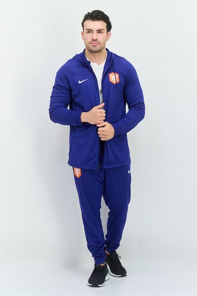 Nike بدلة رياضية رجالية قصة ضيقة من قطعتين بشعار العلامة التجارية، باللون الأزرق