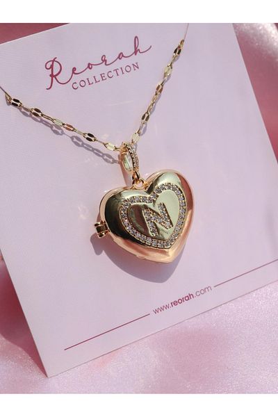 Reorah Collection قلادة من الفولاذ على شكل قلب على شكل حرف L-N