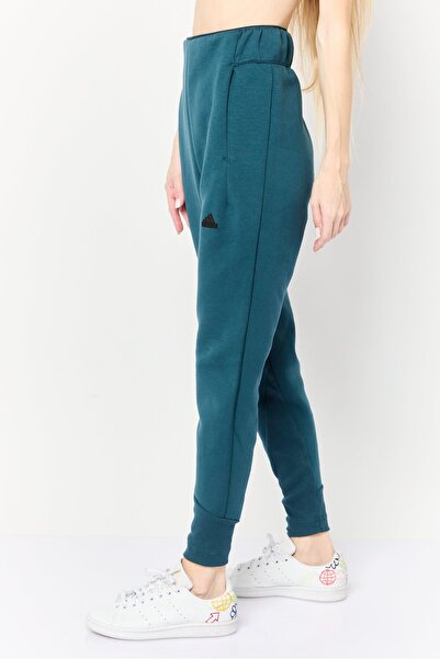 adidas بنطلون رياضي نسائي مناسب للتدريب 7/8، أزرق مخضر