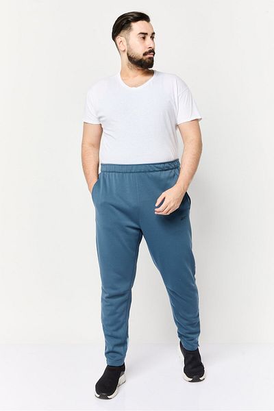 Reebok Men Sportswear Fit Brand Logo Outdoor Sweatpants, Teal Blue