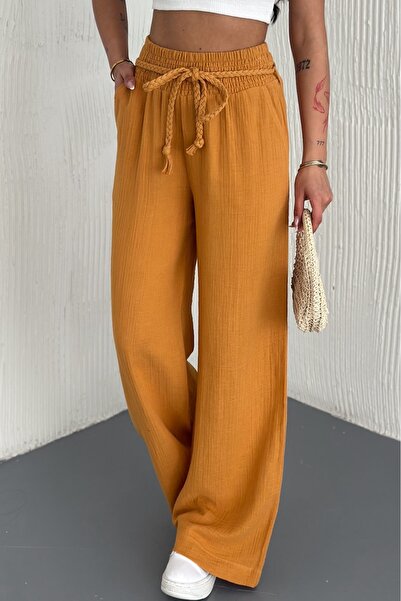 FEMELLE Жіночі помаранчеві штани з плетеним поясом, кишенями та широкими штан...