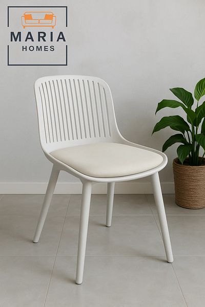 MARIA HOMES Modern White Plastic Chair with Vertical Cutout Back and Cream Seat Cushion
