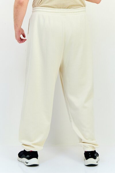 Puma Men Sportswear Fit Outdoor Sweatpants, Beige