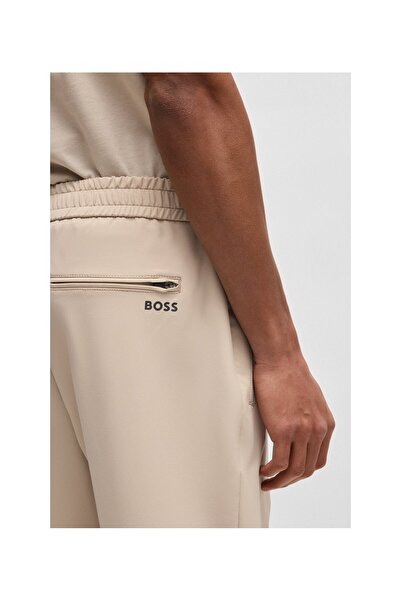 BOSS Su itici streç kumaştan dar kesim pantolon