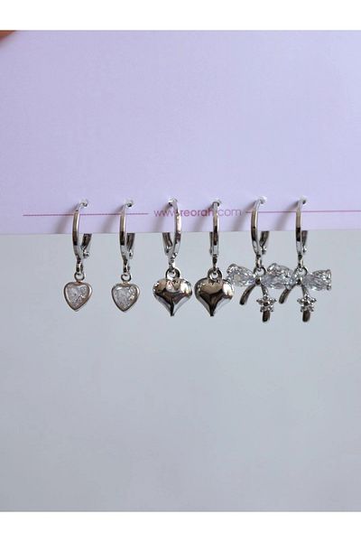 Reorah Collection White Bow Shine Earring Set
