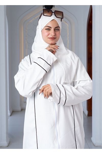 ABAYA Elegant abaya with front zipper and black and white details