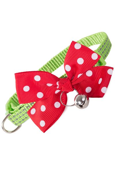 zola Adjustable dog collar made of green fabric with red bow and bell