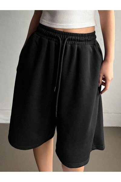 Tarzsokak Pantaloni scurți de damă, de culoare uni, cu talie elastică și șire...