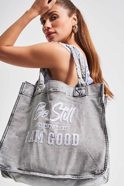 its basic Dark Denim Bag with Gusseted Strap - Two Pockets