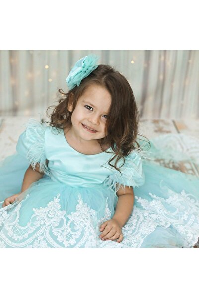 sara tasarım Turkuaz mavisi kuyruklu kız çocuk özel gün elbisesi toka ve kurd...