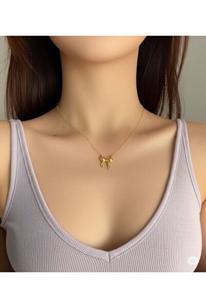 HARİNA قلادة نسائية على شكل فيونكة ذهبية