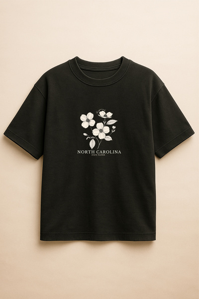 Altair Tr تي شيرت أسود اللون كبير الحجم مطبوع عليه زهور نورث كارولينا للجنسين